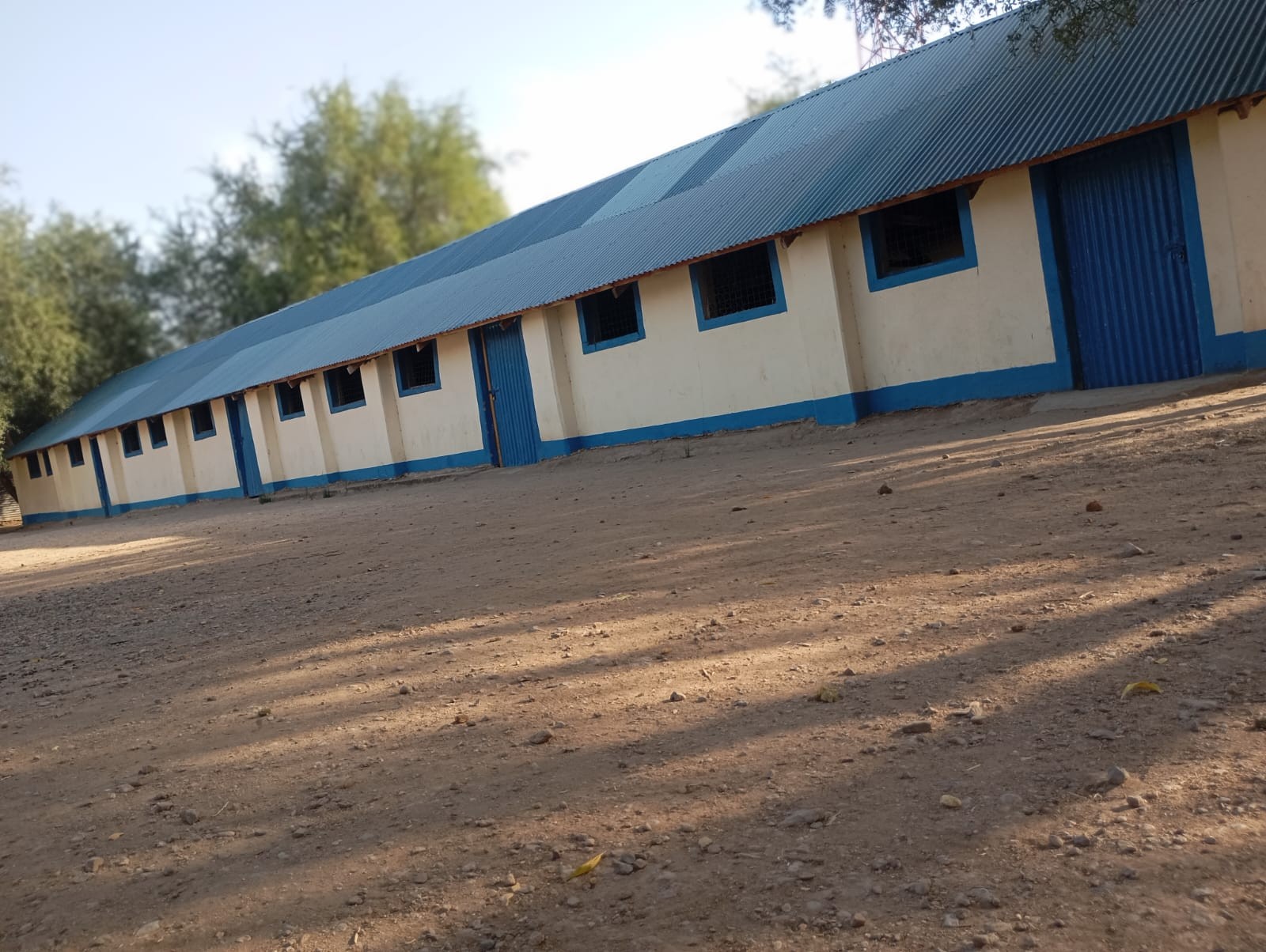 A long classroom block serving learners at the school.