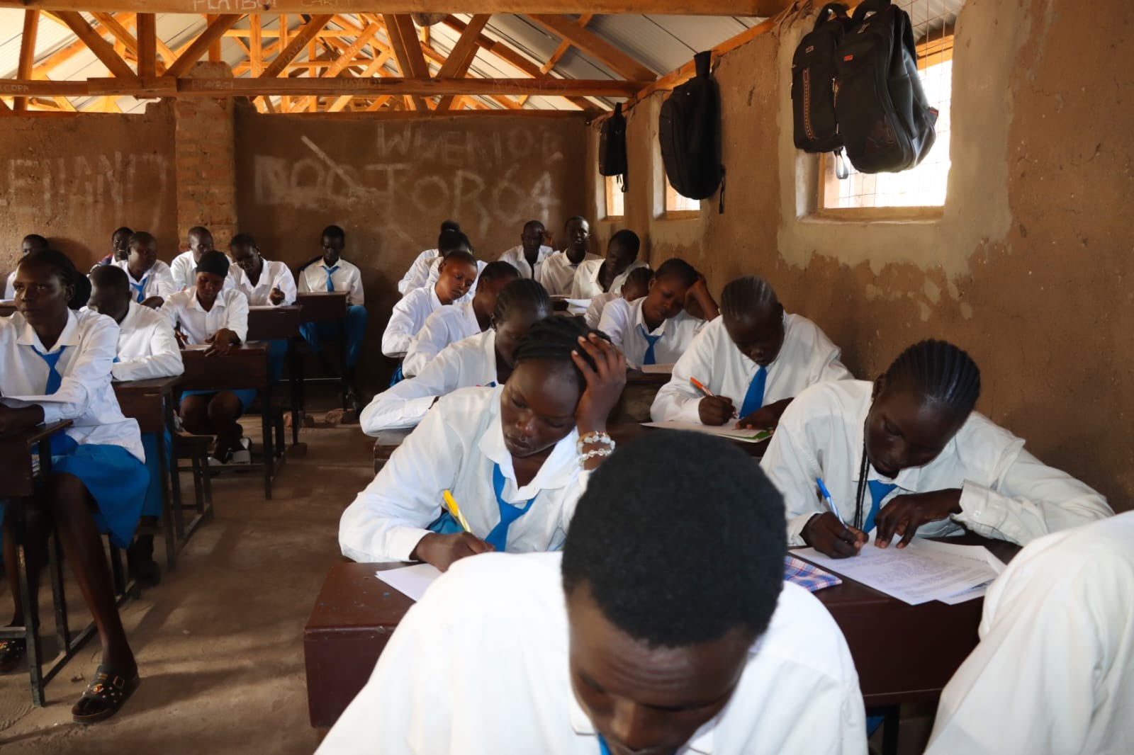 Students focused on classwork inside the classroom.